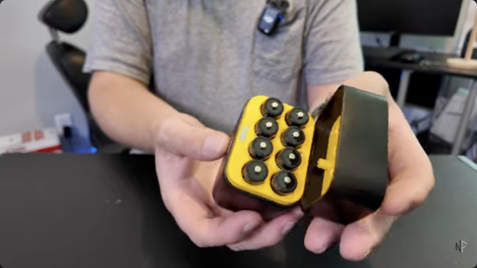 Nalan Finds video showing the open eight-battery charging case